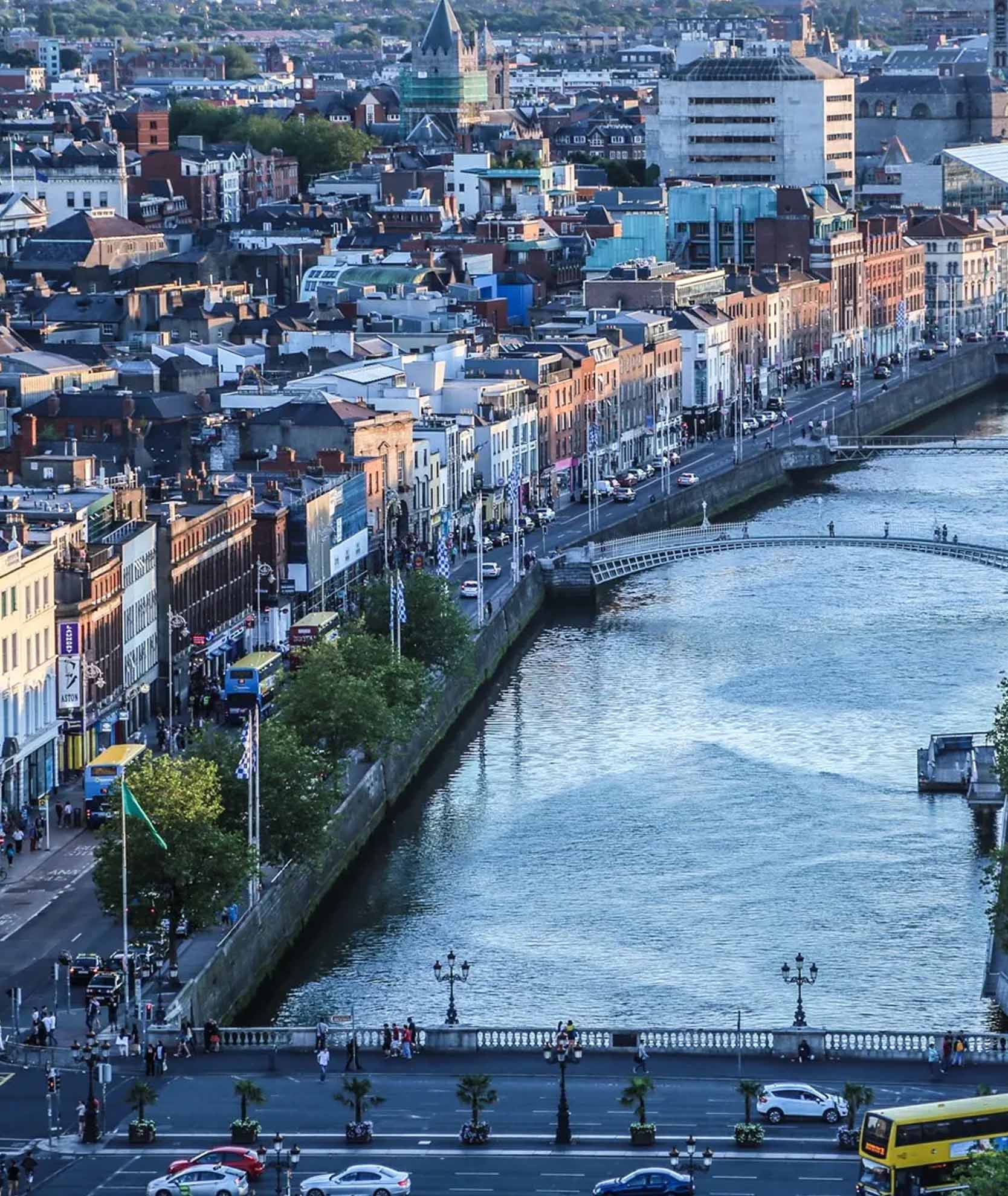 Aerial view of Dublin cityscape, showcasing the River Liffey and Ha'penny Bridge, representing PSCS services for managing safety on construction projects.