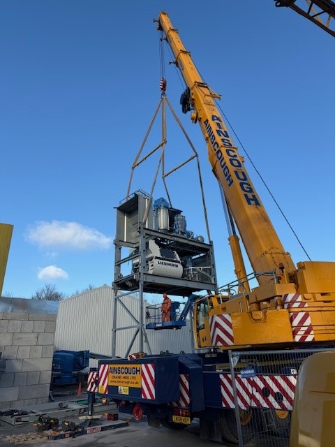 Liebherr Concrete Batching Unit Lift – Myers ReadyMix Huddersfield Liebherr concrete batching unit being installed by Ainscough crane at Myers ReadyMix Huddersfield site
